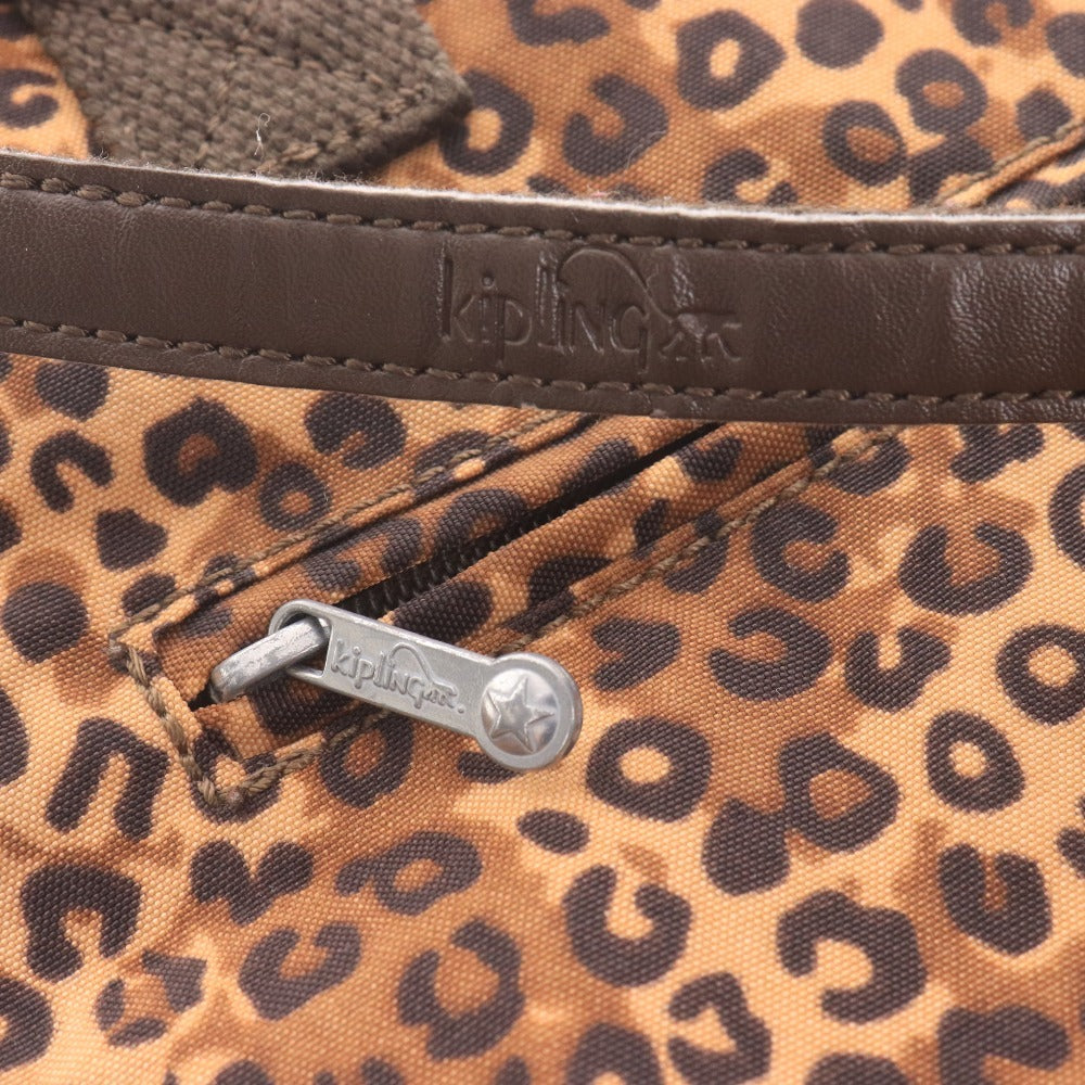 Kipling hand tote bag with zipper closure, leopard print, heart pattern, multicolor, light brown, and black.