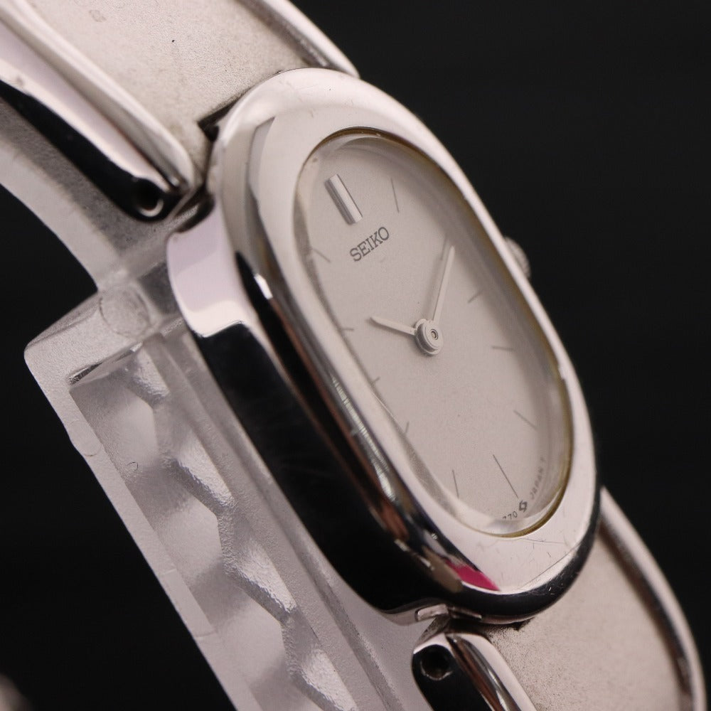 ■ セイコー 腕時計1E20-5440 オーバル クォーツ 51.1g レディース シルバー 文字盤 ホワイト 付属品付き ジャンク