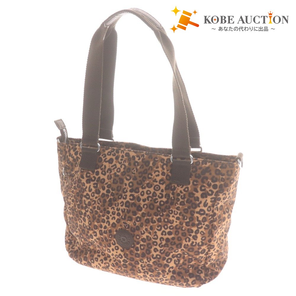 Kipling hand tote bag with zipper closure, leopard print, heart pattern, multicolor, light brown, and black.