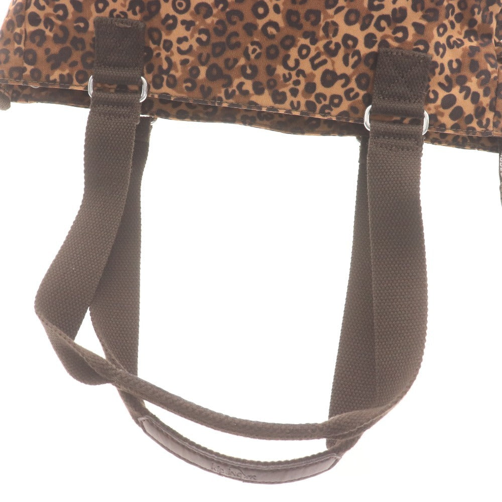 Kipling hand tote bag with zipper closure, leopard print, heart pattern, multicolor, light brown, and black.