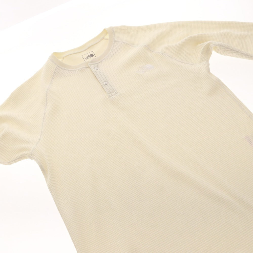 The North Face T-shirt NT62374, long sleeves, button closure, crew neck, solid color, one-point detail, men's/women's, size L, ivory, unused
