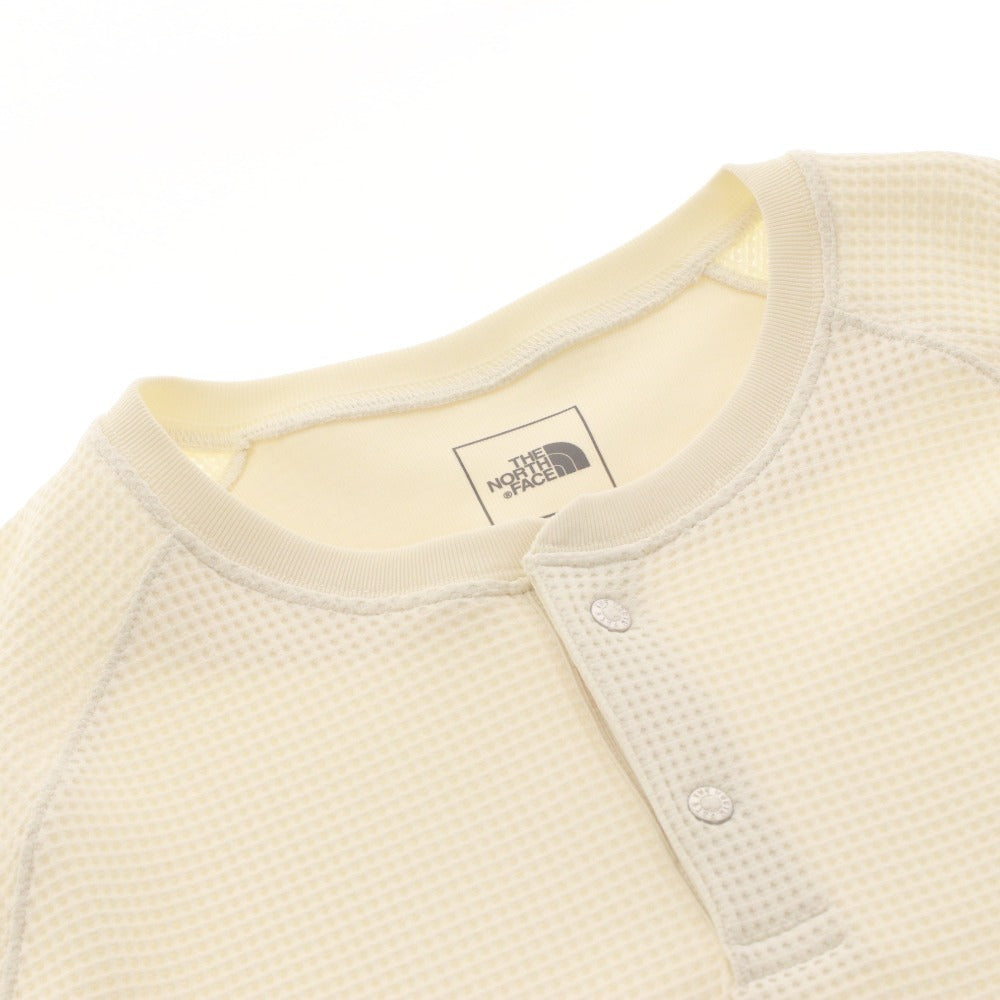 The North Face T-shirt NT62374, long sleeves, button closure, crew neck, solid color, one-point detail, men's/women's, size L, ivory, unused