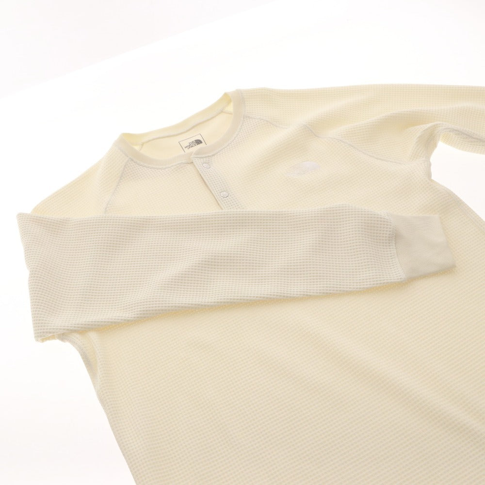 The North Face T-shirt NT62374, long sleeves, button closure, crew neck, solid color, one-point detail, men's/women's, size L, ivory, unused
