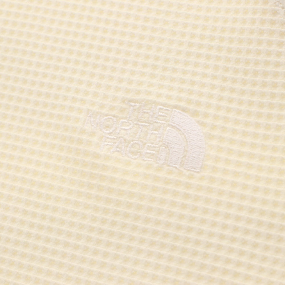 The North Face T-shirt NT62374, long sleeves, button closure, crew neck, solid color, one-point detail, men's/women's, size L, ivory, unused