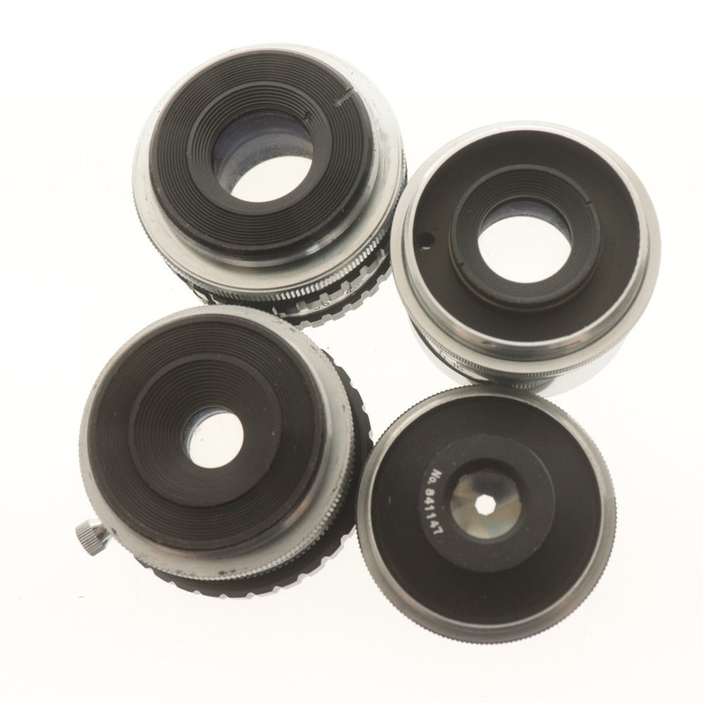 ■ 4-piece camera lens set (bulk sale) E-LUCKY 1:4.0 f=38mm, FUJINAR-E Hexar 1:4.5 f=9cm, 5cm, 75mm, with accessories, light meter, and belt