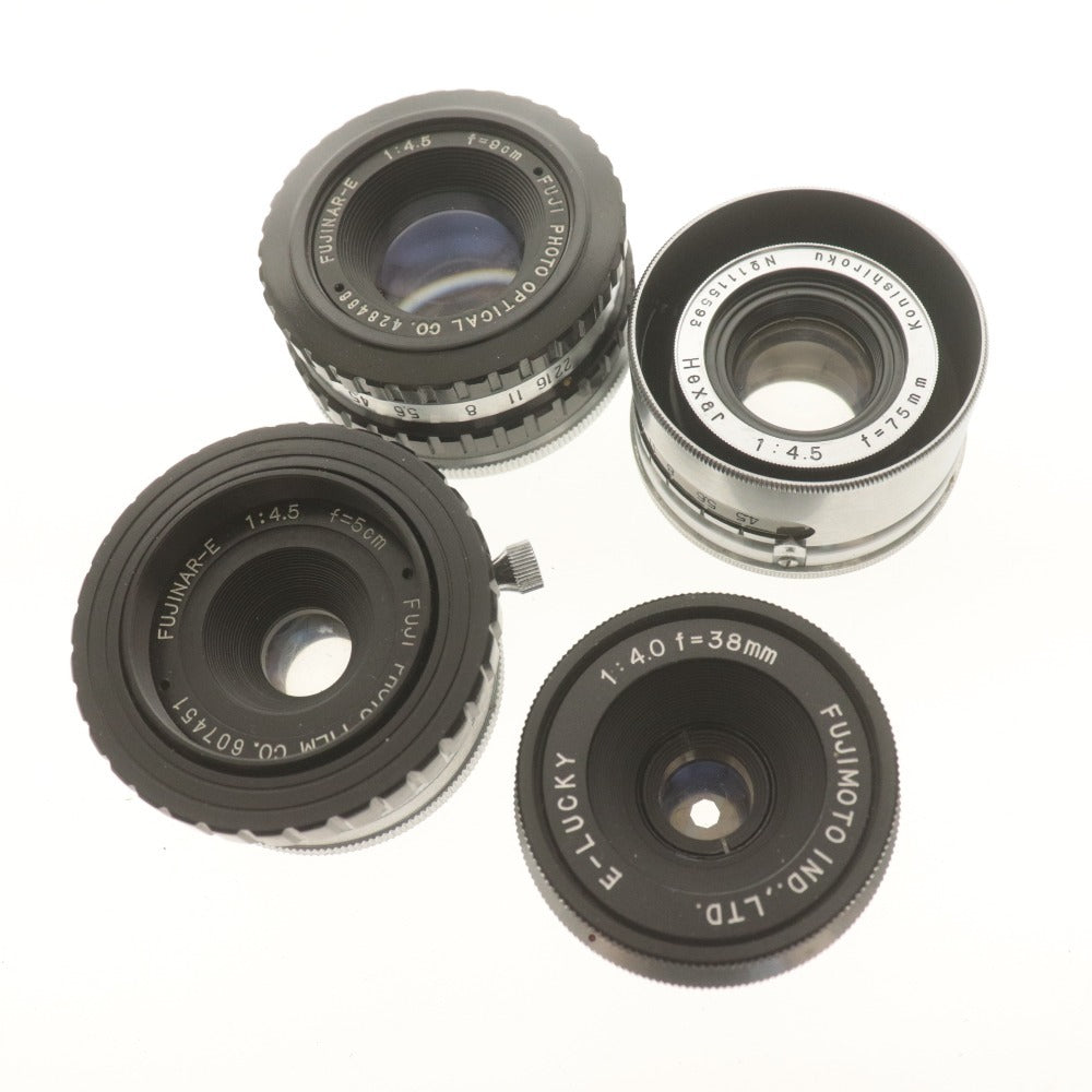 ■ 4-piece camera lens set (bulk sale) E-LUCKY 1:4.0 f=38mm, FUJINAR-E Hexar 1:4.5 f=9cm, 5cm, 75mm, with accessories, light meter, and belt