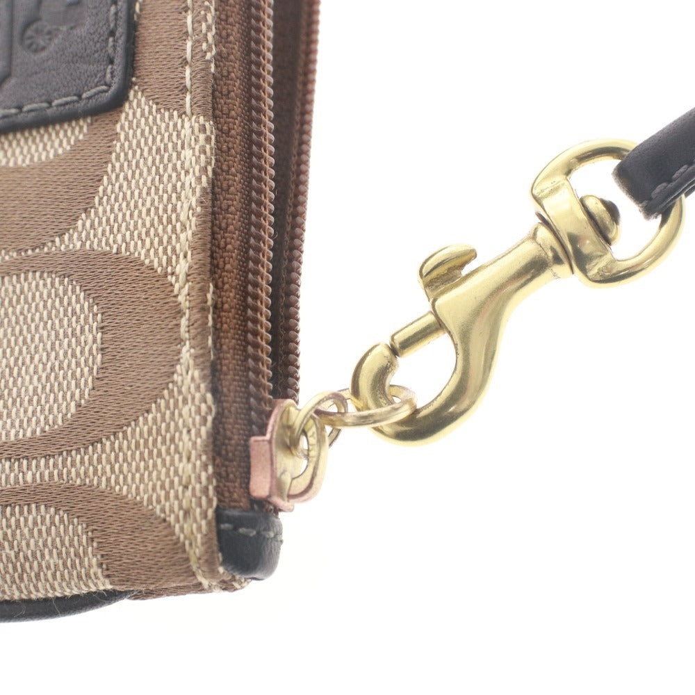 ■ COACH コーチ ポーチ 小物入れ シグネチャー ファスナー 化粧ポーチ レディース ベージュ系 ライトブラウン系 袋付き