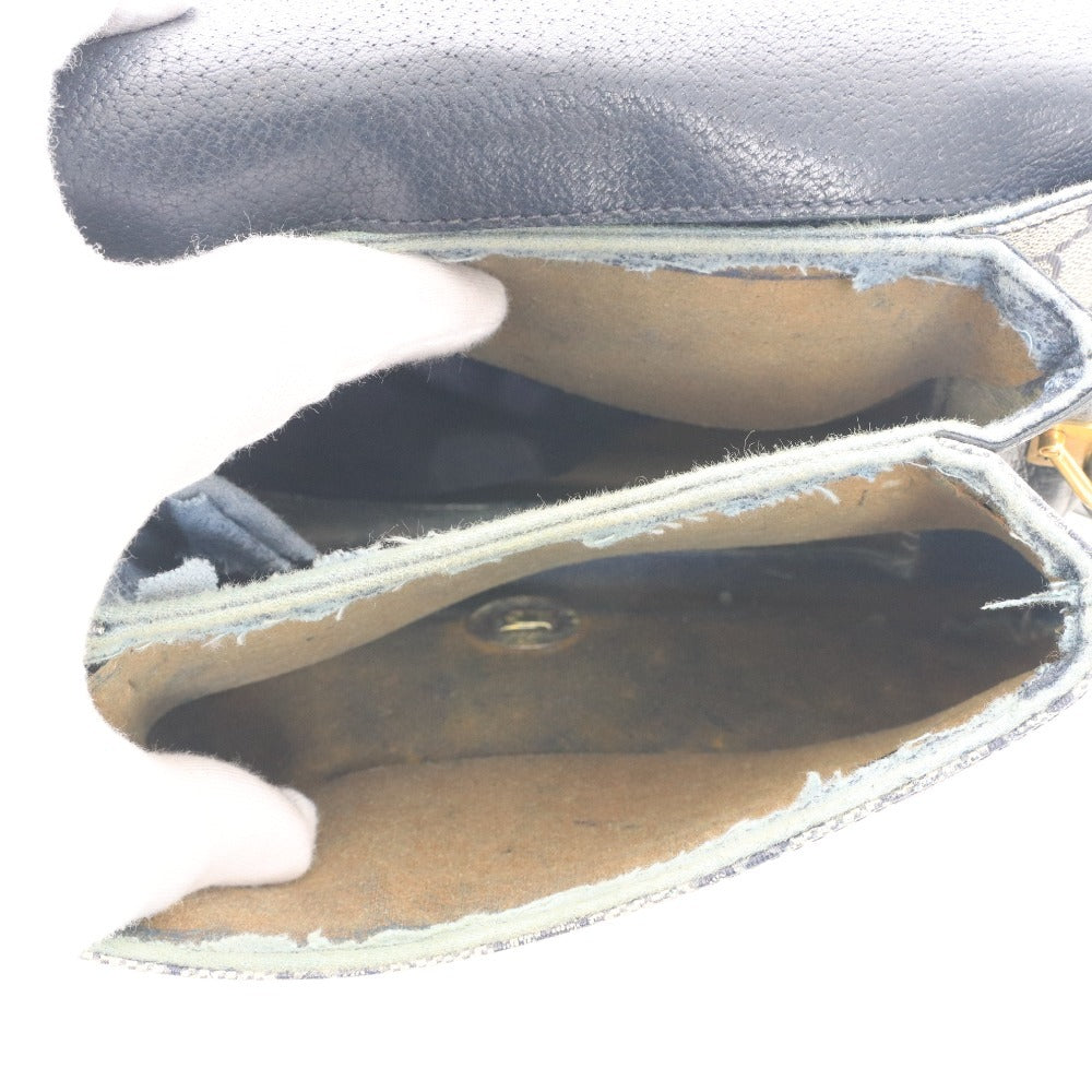 ■ Vintage Gucci shoulder bag with GG Supreme horsebit detail and gold hardware. Women's dark navy.