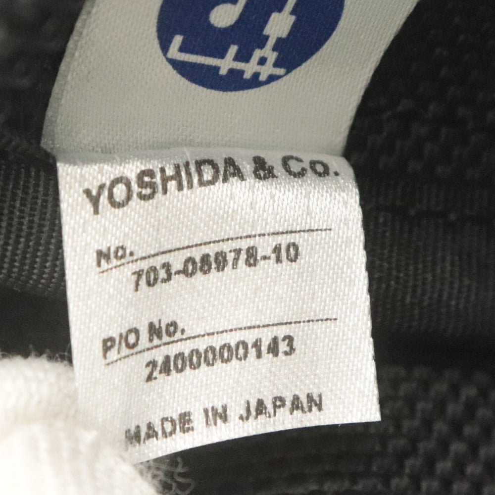 Porter Heat Waist Bag (703-06978) - Made in Japan by Yoshida Kaban. Available in black for men and women. Includes accessories.