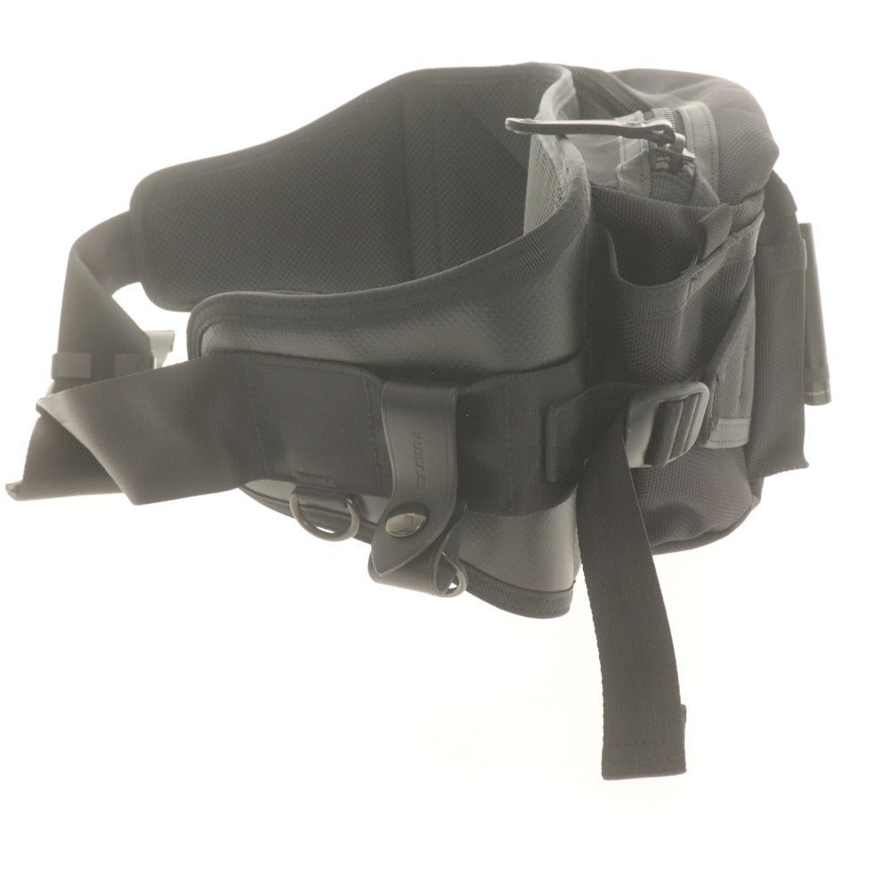 Porter Heat Waist Bag (703-06978) - Made in Japan by Yoshida Kaban. Available in black for men and women. Includes accessories.