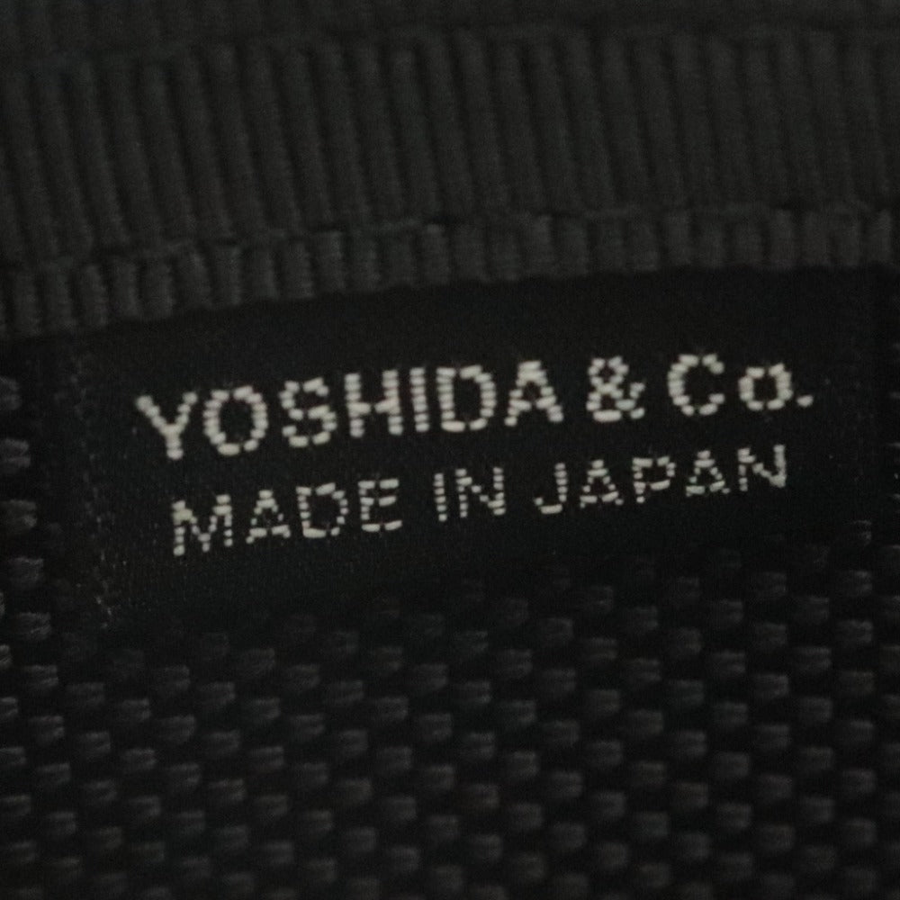 Porter Heat Waist Bag (703-06978) - Made in Japan by Yoshida Kaban. Available in black for men and women. Includes accessories.