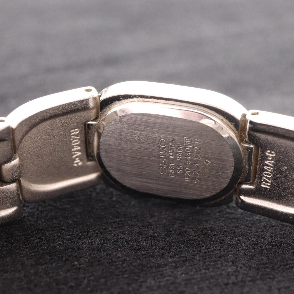 ■ セイコー 腕時計1E20-5440 オーバル クォーツ 51.1g レディース シルバー 文字盤 ホワイト 付属品付き ジャンク