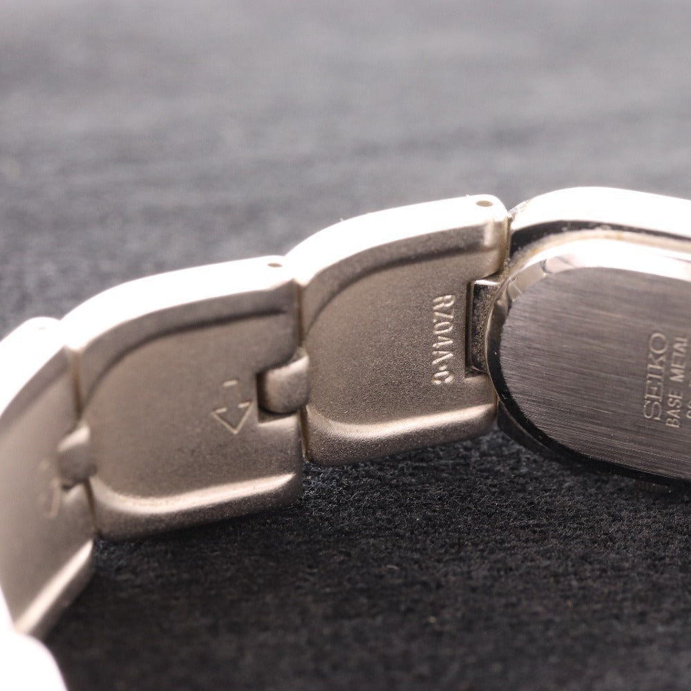 ■ セイコー 腕時計1E20-5440 オーバル クォーツ 51.1g レディース シルバー 文字盤 ホワイト 付属品付き ジャンク