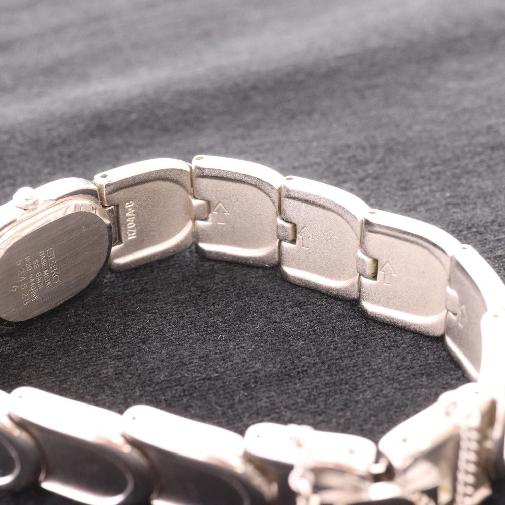 ■ セイコー 腕時計1E20-5440 オーバル クォーツ 51.1g レディース シルバー 文字盤 ホワイト 付属品付き ジャンク