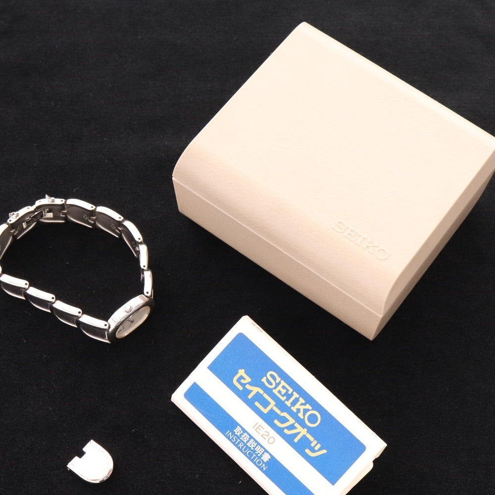 ■ セイコー 腕時計1E20-5440 オーバル クォーツ 51.1g レディース シルバー 文字盤 ホワイト 付属品付き ジャンク