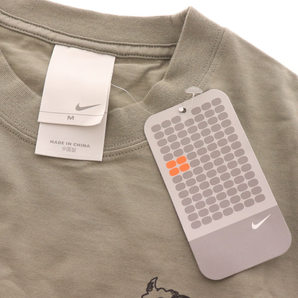■ NIKE ナイキ 天明屋尚筆 限定コラボ Tシャツ 半袖 トップス 2005年 天明屋尚筆柄 ロゴ プリント メンズ M カーキグレー タグ付き