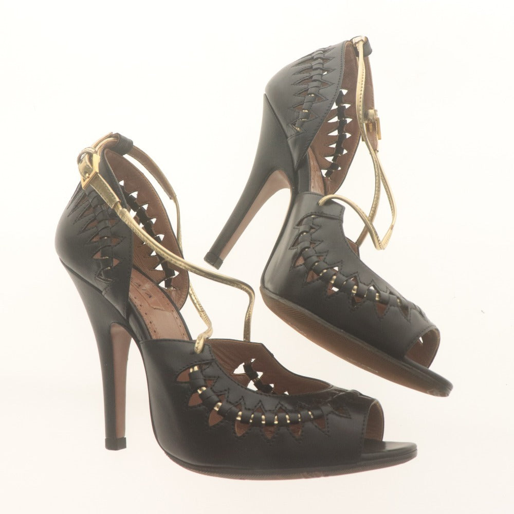 ■ ALAIA アライア サンダル 靴 ストラップ オープントゥ レディース 36 1/2 (23.5cm相当) ブラック ゴールド