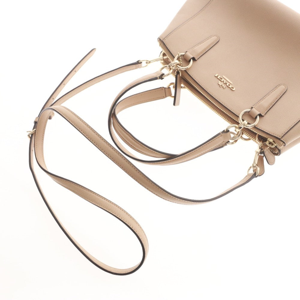 ■ コーチ ハンドバッグ ショルダーバッグ 鞄 ミニクリスティーキャリーオール レザー レディース ベージュ