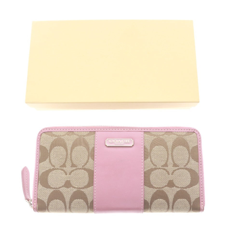 ■ COACH コーチ 長財布 ウォレット ファスナー 札 小銭入れ シグネチャー レディース ライトブラウン ピンク