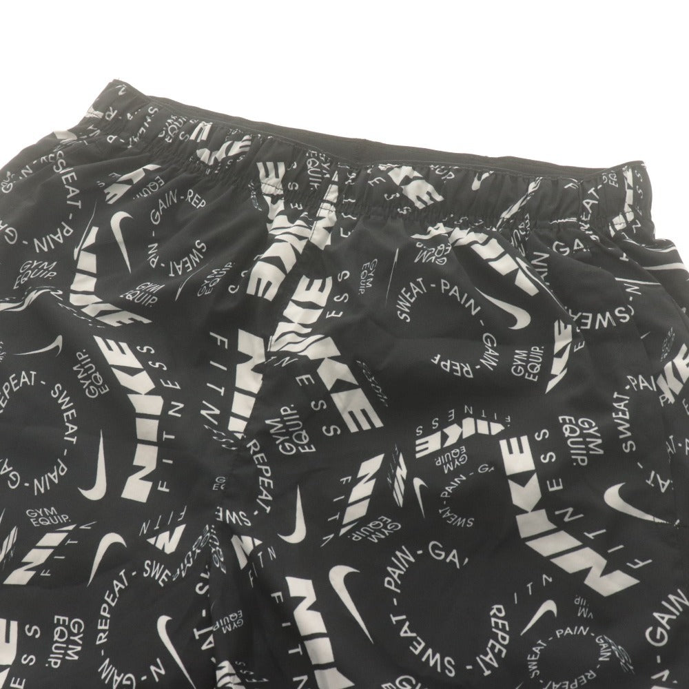 ■ ナイキ ランニングパンツ ボトムス ドライフィット チャレンジャー 7インチ ショーツ AOP Dri-FIT ロゴ柄 トレーニング メンズ M 白黒