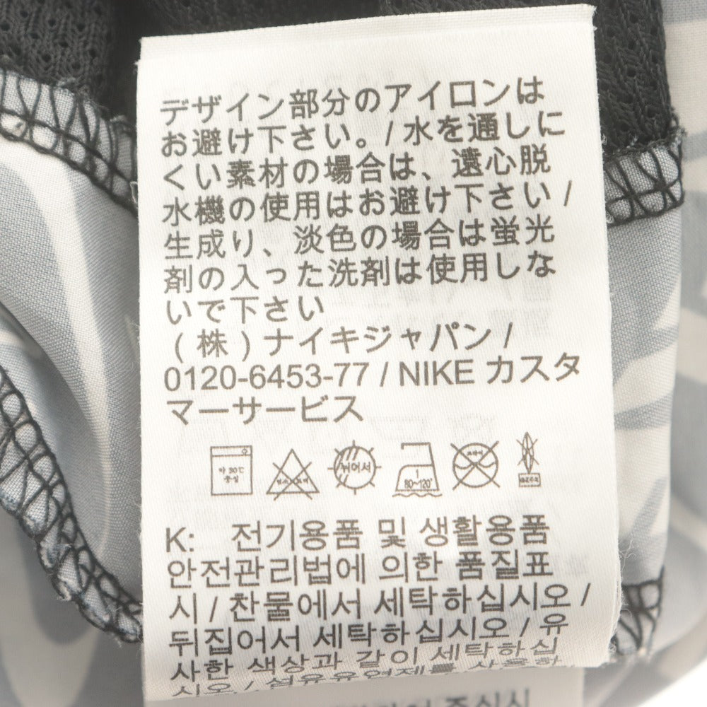 ■ ナイキ ランニングパンツ ボトムス ドライフィット チャレンジャー 7インチ ショーツ AOP Dri-FIT ロゴ柄 トレーニング メンズ M 白黒